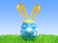 Easter blue egg - a hare Royalty Free Stock Photo