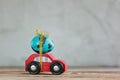 Easter blue egg on red car. Holiday easter concept. Royalty Free Stock Photo