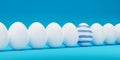 Easter Blue ornate egg around white eggs in row closeup. Blue painted egg in a row of the white eggs. Happy easter 3D rendering