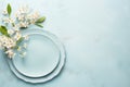 Easter blue table setting with spring blossom flowers. Generative AI Royalty Free Stock Photo