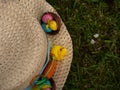 Easter bonnet straw hat decorated with eggs and flowers Royalty Free Stock Photo