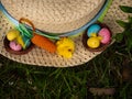 Easter bonnet straw hat decorated with eggs and flowers Royalty Free Stock Photo
