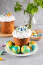 Easter bread. Cakes with icing. Spring festival 2022. Kulich. Happy Easter day. Cake with raisins