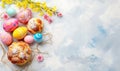 Easter bread with painted eggs on blue background. Backdrop for holiday greetings