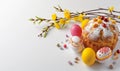 Easter bread with yellow and pink painted eggs on blue background. Backdrop for holiday greeting