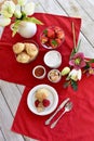 Easter breakfast brunch with homemade biscuits jam and clotted cream