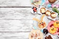 Easter breakfast or brunch side border. Top view on a white wood background. Royalty Free Stock Photo