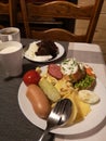 Easter breakfast - eggs, boiled white sausages and vegetables