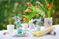 Easter breakfast with eggs and dekoration on a white table Royalty Free Stock Photo