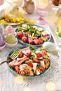 Easter breakfast with fresh salads and ham cones filled with eggs and vegetables Royalty Free Stock Photo