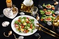 Easter breakfast with fresh salad and eggs on black table Royalty Free Stock Photo