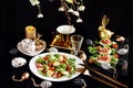 Easter breakfast with fresh salad and eggs on black table Royalty Free Stock Photo