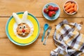 Easter breakfast for kids. Easter bunny shaped pancake with fruits Royalty Free Stock Photo