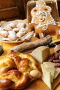 Easter breakfast typical of the Abruzzo region in Italy with Easter pizza eggs salami sweet cheese called pupa and bocconotti typi