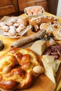Easter breakfast typical of the Abruzzo region in Italy with Easter pizza eggs salami sweet cheese called pupa and bocconotti typi