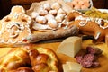 Easter breakfast typical of the Abruzzo region in Italy with Easter pizza eggs salami sweet cheese called pupa and bocconotti typi