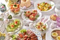 Easter breakfast with vegetable salads, cold cuts and deviled eggs Royalty Free Stock Photo