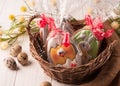Easter brown wrapped cookies in a brown wicker basket