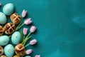 Easter brunch concept. Top view photo of a delicious spread of colorful dyed eggs, hot cross buns