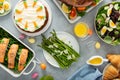 Easter brunch with spiral cut ham and roasted salmon Royalty Free Stock Photo