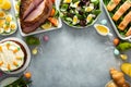 Easter brunch with spiral cut ham and roasted salmon Royalty Free Stock Photo