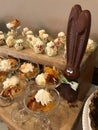 Easter Buffet Dessert Table Featuring a Chocolate Bunny with Big Ears