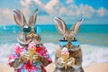 Easter bunnies couple enjoying ice cream on sunny beach with blue sky background. Anthropomorphic animals