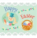 Easter bunny with carrots and colored eggs and willow branch. Royalty Free Stock Photo