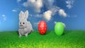 Easter background with rabbit and eggs in the grass Royalty Free Stock Photo