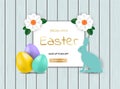 Easter Bunny with eggs on wooden background Royalty Free Stock Photo