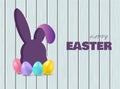 Easter Bunny with eggs on wooden background Royalty Free Stock Photo