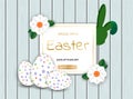 Easter Bunny with eggs on wooden sale background Royalty Free Stock Photo