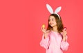 Easter bunny hold painted eggs. happy easter. smiling kid in rabbit ears. Egg hunt on spring holiday. Holiday