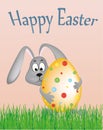 Easter bunny holding a large decorated egg. Rabbit on the grass. Greeting card