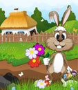 Easter bunny near a farmhouse