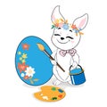 Easter bunny with a paintbrush paints an Easter egg. Vector illustration. Greeting card. Cartoon animals isolated Royalty Free Stock Photo