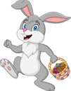 Easter bunny rabbit with Easter basket full of decorated Easter eggs