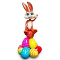 Easter bunny sitting on pile of egg Royalty Free Stock Photo