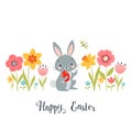 Easter bunny among spring flowers