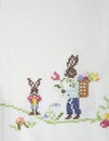 Easter bunny on a white tablecloth.