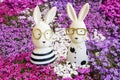 Easter bunnies in pink, violet and white phlox