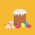 Easter cake, colored eggs and a cherry branch with flowers Royalty Free Stock Photo