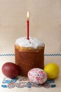 Easter cake with eggs and candle