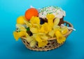Easter cake, eggs and flowers in a basket Royalty Free Stock Photo