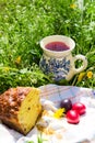 Easter cake, eggs and jug with compote