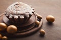 Easter cake and golden eggs on wooden table Royalty Free Stock Photo