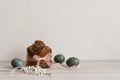 Easter cake and marble blue painted eggs, white flowers, festive composition, Russian Orthodox tradition, selective focus