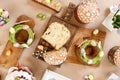 Easter cake orthodox sweet bread kulich and colorful chocolate eggs on festive table Royalty Free Stock Photo