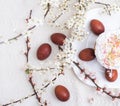 easter cake and red eggs on rustic wooden table. Top view. Royalty Free Stock Photo