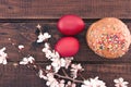 Easter cake and red eggs on rustic wooden table. Top view Royalty Free Stock Photo